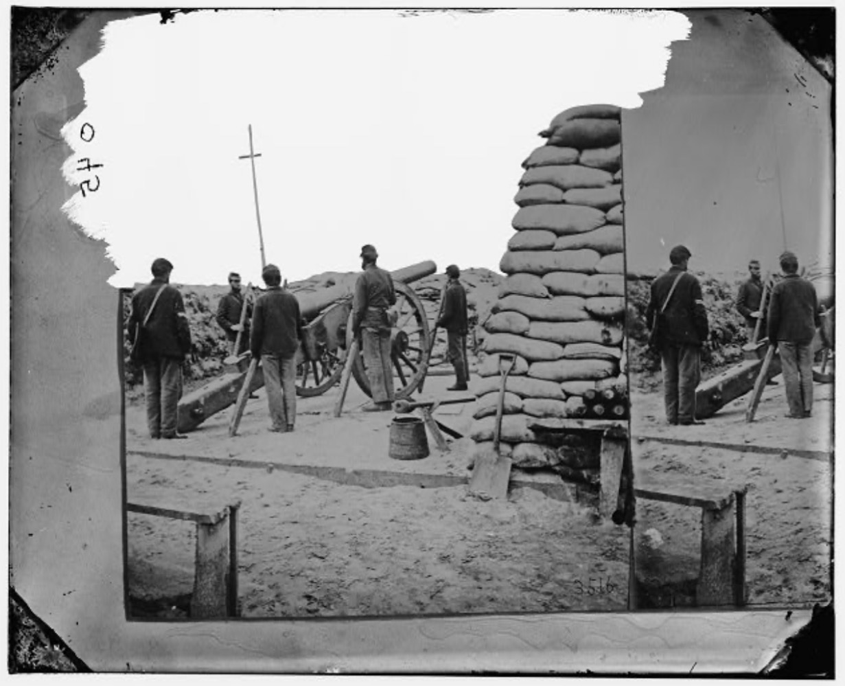Union gun crew with the Swamp Angel cannon on Morris Island, South Carolina.